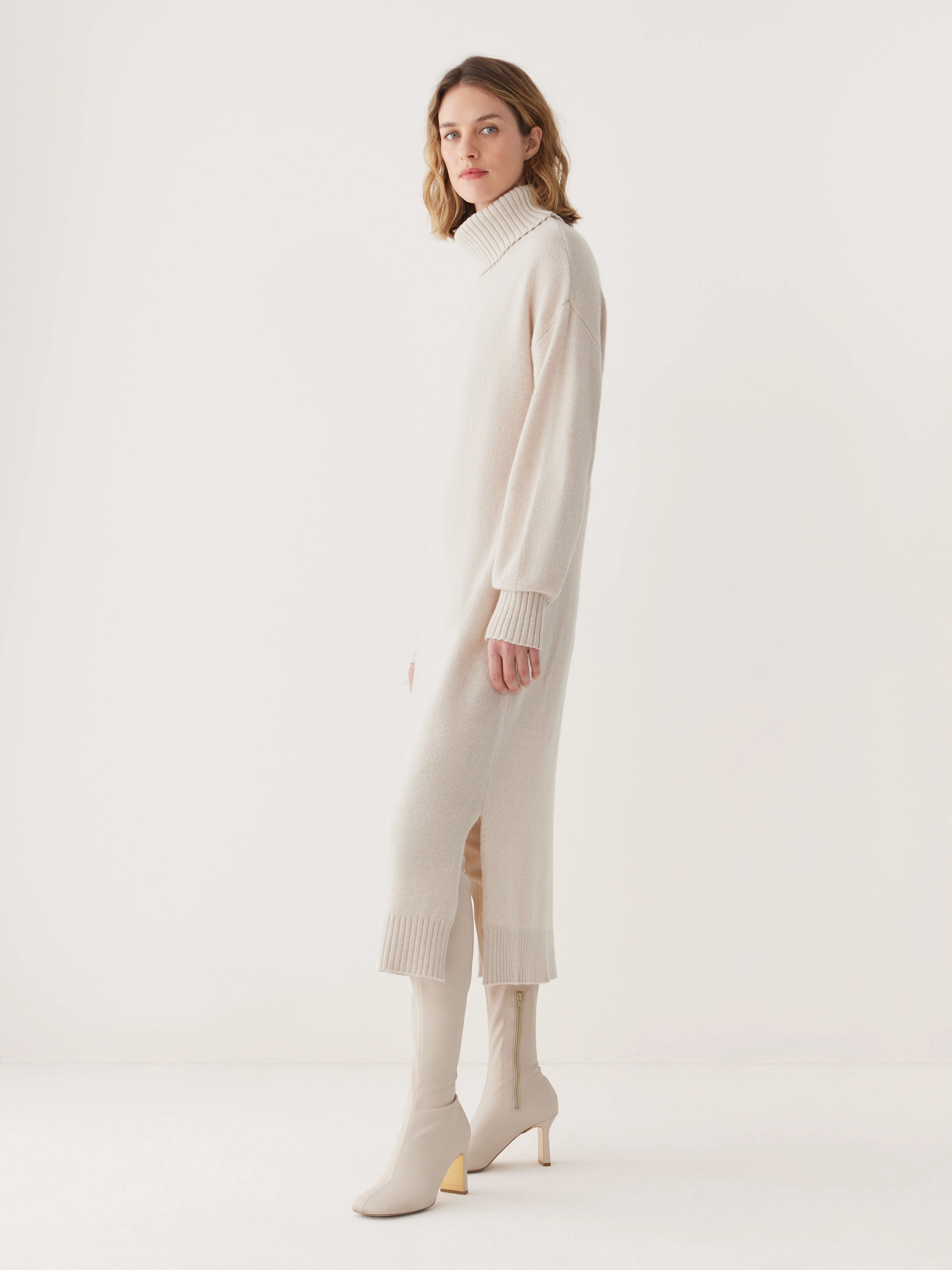 The Turtleneck Sweater Dress in Cream
